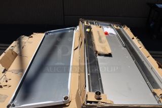 Brand new Regency 600T9B30723 stainless steel table with poly top, undershelf, and 6" backsplash. Original packaging damaged.