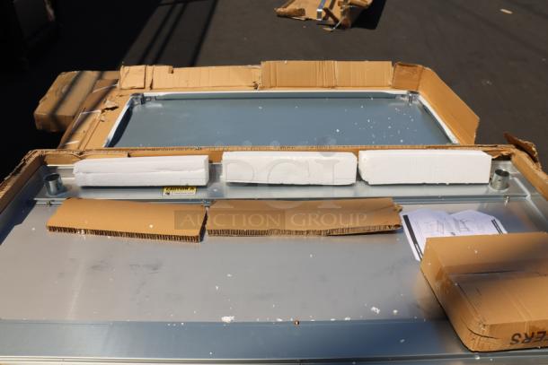 Regency 30" x 60" equipment stand, stainless steel, model 600ES3060GK, with damaged packaging, may be scratched/dented.