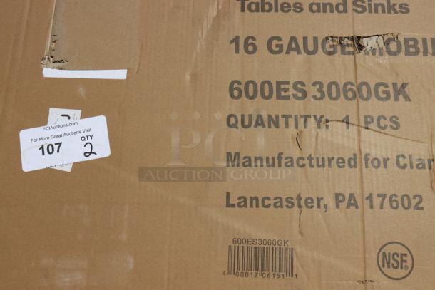 Cardboard packaging for Regency 16 Gauge Stainless Steel Stand, 30"x60", Model 600ES3060GK. Packaging is damaged.