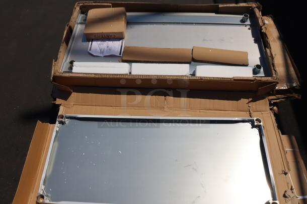 Regency 30"x60" stainless steel stand, model 600ES3060GK, in damaged packaging, may have scratches/dents.