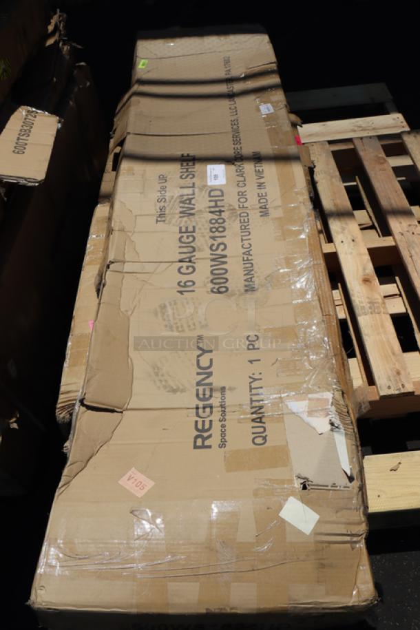 Regency 600WS1884HD 16-Gauge Stainless Steel 18"x84" wall shelf in damaged original packaging. Minor scratches and dings.
