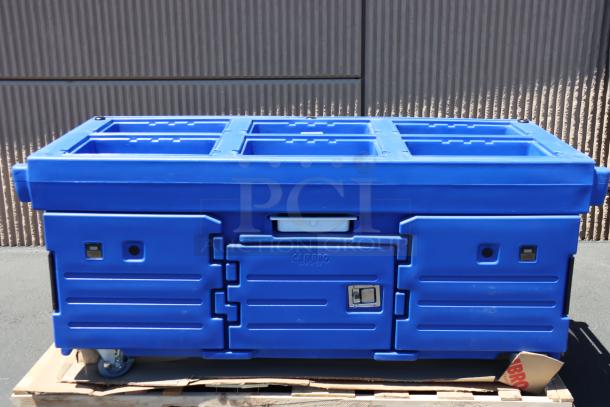 Brand new Cambro KVC854186 CamKiosk® vending cart, navy blue, with 4 pan wells, on wheels, out of original packaging.