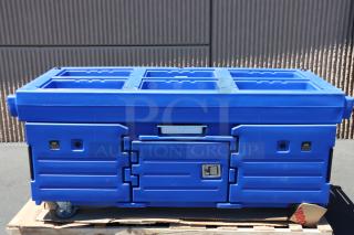 Brand new Cambro KVC854186 CamKiosk® vending cart, navy blue, with 4 pan wells, on wheels, out of original packaging.