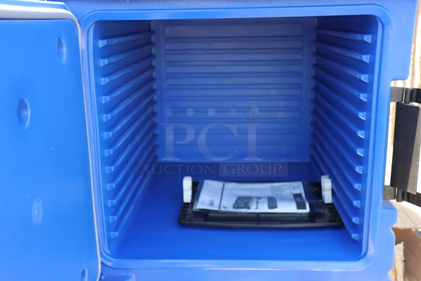 Cambro KVC854186 CamKiosk® navy blue vending cart interior, showing ribbed walls and included documentation. Brand new.