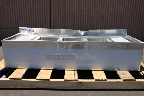 Brand new Regency 600B32160213 60"x21" three-bowl underbar sink with two 13" drainboards, scratch-n-dent condition.