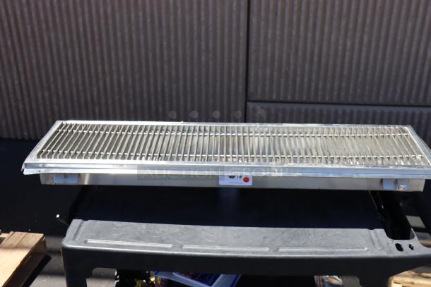 BRAND NEW Regency 600FT1248SS 12"x48" stainless steel floor trough with grate. Slight scratches, 14-gauge, durable.
