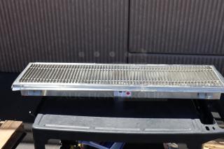 BRAND NEW Regency 600FT1248SS 12"x48" stainless steel floor trough with grate. Slight scratches, 14-gauge, durable.