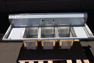 Brand new Regency 58" stainless steel sink, model 600S31014212, with 3 compartments and 2 drainboards. Scratch-n-dent.
