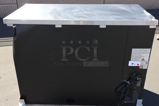 Avantco UBB-48G-HC back bar refrigerator, black, 48", narrow glass door, LED lighting, dented side, working order, S/N: 805208274.