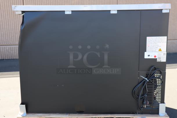 Brand new Avantco UBB-48G-HC back bar fridge, black, glass doors, LED lighting, slight dent on back, working condition, S/N: 805208274.