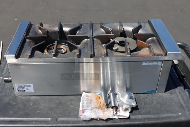 Avantco Chef Series CAG-R-2-12 gas range, 2 burners, 12" countertop, 50,000 BTU, scratch-n-dent, serial 1150880000006.