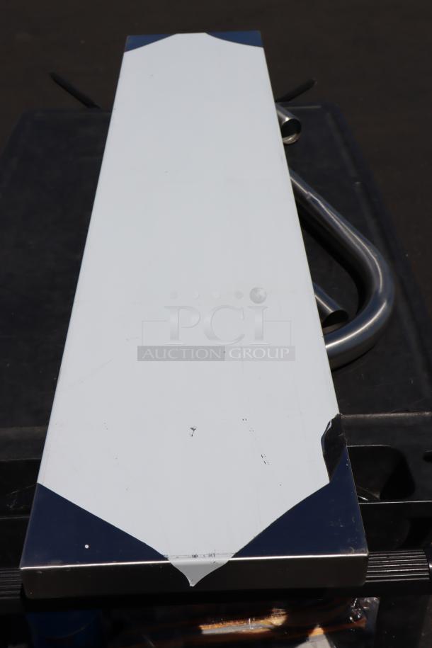 Brand new Regency 600ESSCB48 stainless steel work surface, 10"x48", for equipment stands. Scratch-n-dent condition includes minor marks.
