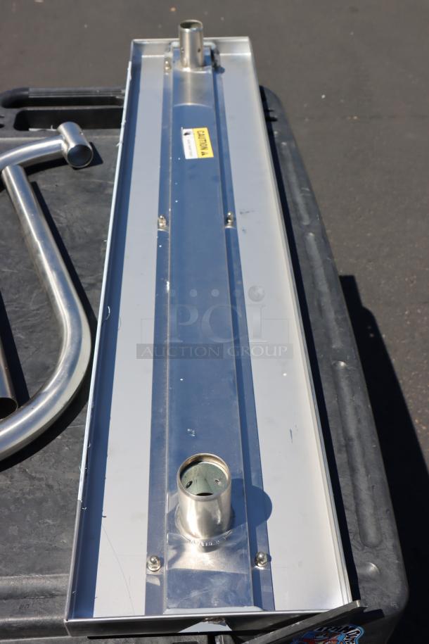 Brand new Regency 600ESSCB48, 10" x 48" stainless steel adjustable work surface for 48" equipment stands, minor scratches.