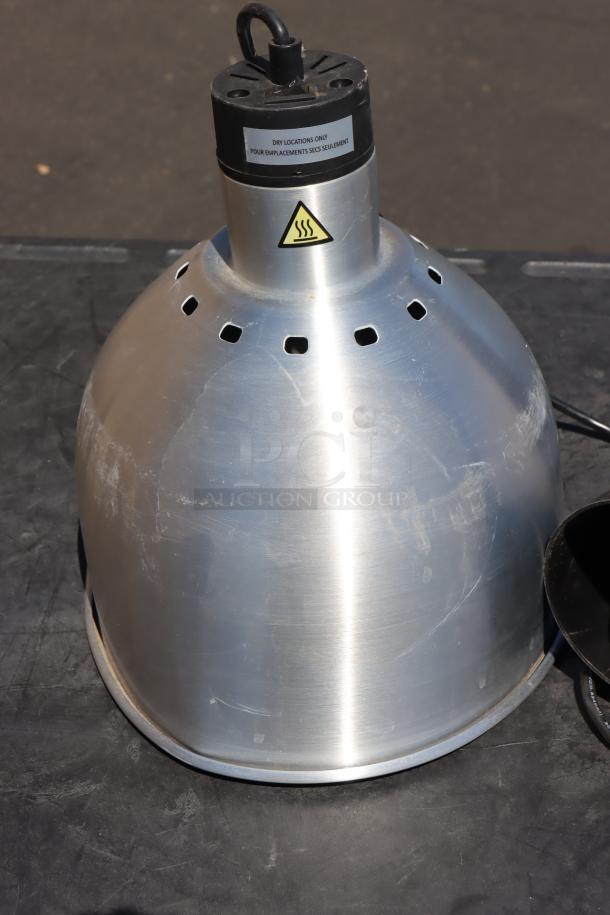 Brand new ServIt HLS85SS 8' heat lamp, ceiling mount, stainless steel dome shade, slight scratches. Model HLS85SS.