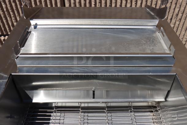 Brand new Vollrath CVT4-208900 convertible conveyor toaster, stainless steel, 1.5"-3" opening, 208V, 3600W, minor scratches.