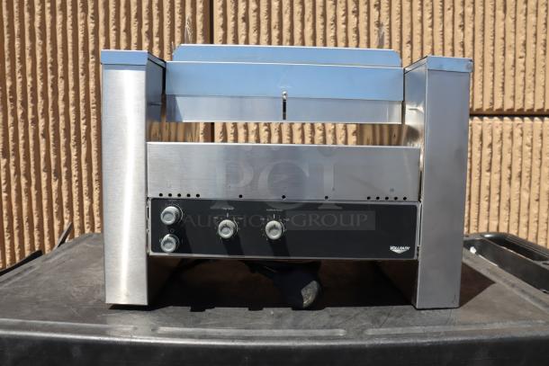 Brand new Vollrath CVT4-208900 conveyor toaster, 1.5"-3" opening, 208V, 3600W, slight scratches, stainless steel finish.