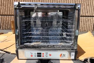 Brand new Cooking Performance Group COH-D4-M convection oven, 4 trays, half-size, digital controls, moisture injection, slight dents.