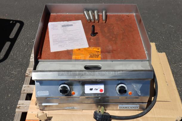 Brand new Garland ED-24G-0036 electric countertop griddle, 208V, 1 Phase, 6.7 kW. Scratch-and-dent, leg mounts broken.