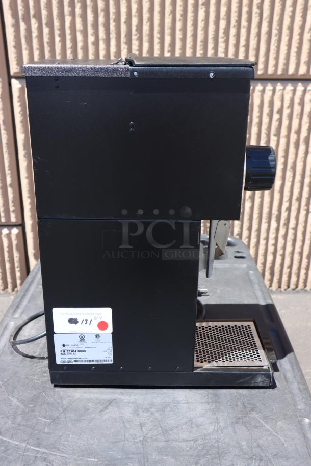 Brand new Bunn 22104.0000 G1 HD 1 lb. black bulk coffee grinder. Minor scratch-n-dent. Model and voltage label visible.