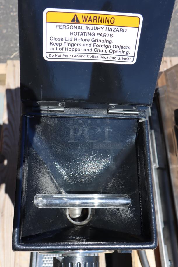 Brand new Bunn G1 HD bulk coffee grinder, model 22104.0000, black, 1 lb capacity, 120v. Visible safety warning label.