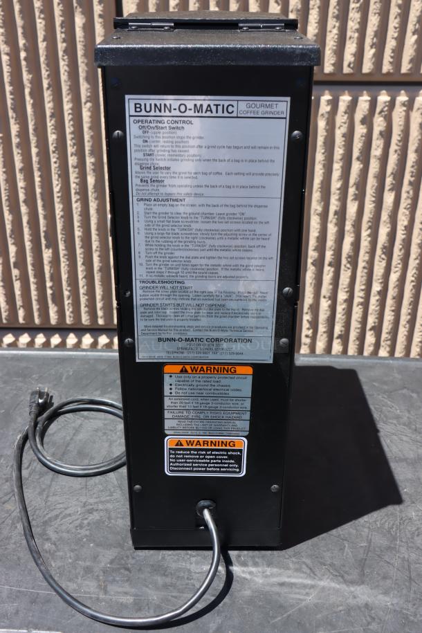 Brand new Bunn 22104.0000 G1 HD black bulk coffee grinder, 1 lb capacity, 120v. Serial No. G100034580, scratch-n-dent condition.