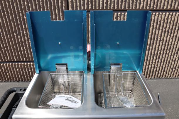 Avantco F202 30 lb. dual tank electric fryer, brand new, out of packaging, features two baskets, 208-240V, 5400/7200W.