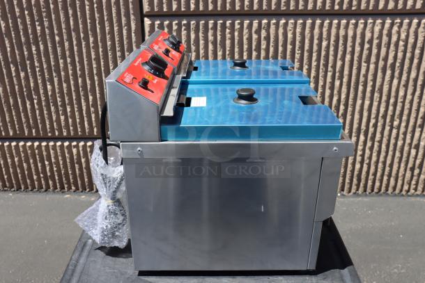 Brand new Avantco F202 dual tank electric countertop fryer, 30 lb capacity, 208-240V, 5400/7200W, out of packaging.