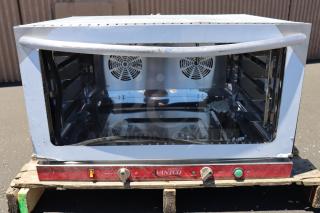 Brand new Avantco CO-46M full-size countertop convection oven with moisture injection, 4.4 cu. ft., showing minor scratches.