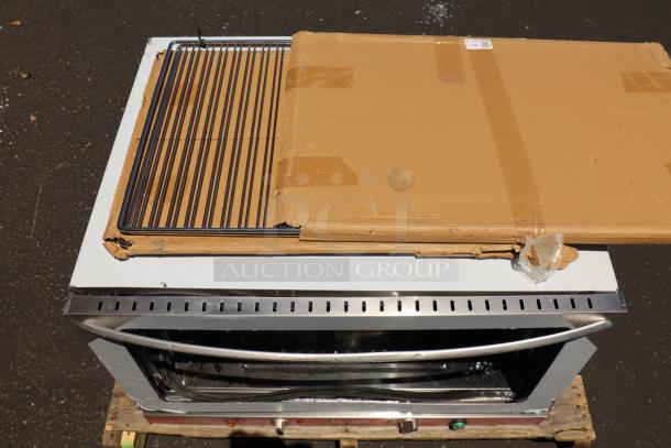 Brand new Avantco CO-46M countertop convection oven with minor scratches, includes rack, 4.4 cu. ft., 208/240V.
