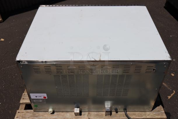 Brand new Avantco CO-46M convection oven with visible dents. 4.4 cu. ft., 208/240V, 3,500/4,600W.