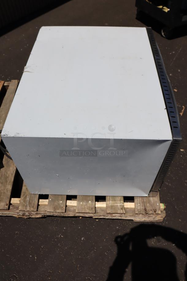 Brand new Avantco CO-46M countertop convection oven with moisture injection, 4.4 cu. ft., visible scratch and dent marks.