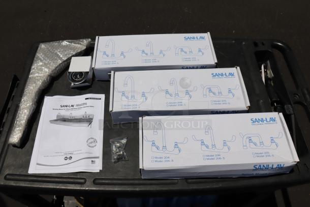 BRAND NEW Sani-Lav 5A3F-0.5 wall-mounted hand sink with three 0.5 GPM faucets, original packaging damaged.