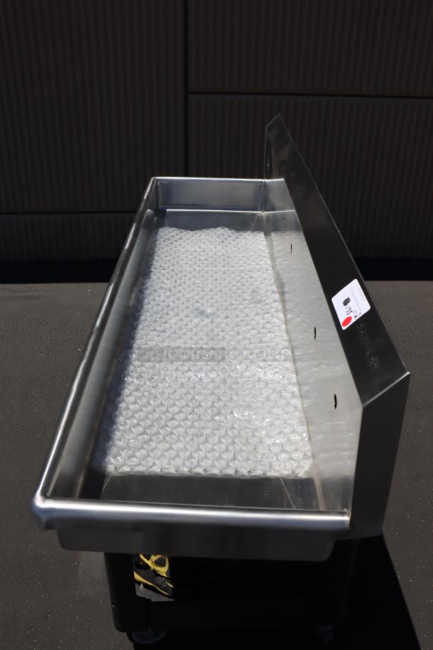 Sani-Lav 5A3F-0.5 wall-mounted hand sink, 68"x20", with 3 faucets, potential scratching/denting, bubble wrap visible.
