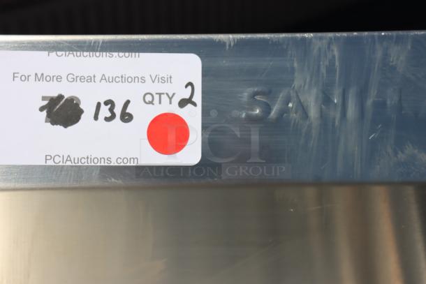 Sani-Lav 5A3F-0.5 wall-mounted hand sink, 68"x20", scratched and dented. Tag indicates quantity 2; visit PCI Auctions.