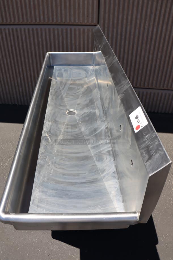 Brand new Sani-Lav 5A3F-0.5 wall-mounted multi-station hand sink, 68"x20". May have scratches, dents; original packaging damaged.