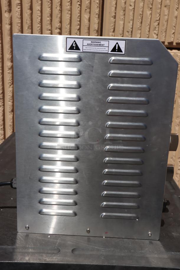 Avantco BT18AXL Vertical Contact Conveyor Bun Toaster, 120V, 1600W, brand new with minor scratches, warning label visible.