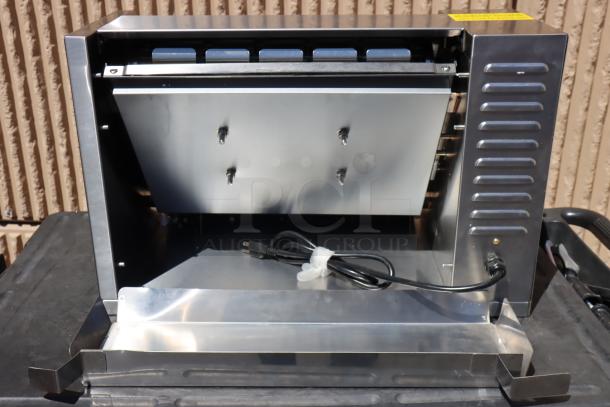 Brand new Avantco BT18AXL conveyor bun toaster, 120V, 1600W, scratch-n-dent. Features extended feed tray, stainless steel finish.
