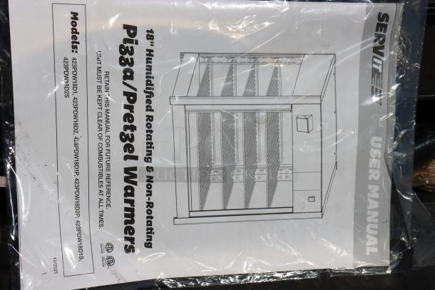 BRAND NEW SCRATCH-N-DENT ServIt PDW18D1P 18" Pizza Warmer. Features rotating 4-shelf and pretzel rack. Glass pane broken. Manual visible. Serial #: 1457301300066.