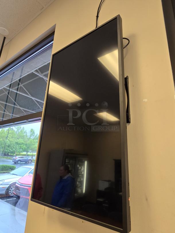 Sharp PN-B401K 40" Commercial Display LCD Monitor with Wall Mount. S/N: 8F043451. Monitor Can Be Installed In Either Portrait, Landscape Mode, Face-Up Or Even Face-Down Applications. See photos for examples. Features: Digital Signage Display - 39.5 Lcd Cortex A17 - 2 Gb - 1920 X 1080 - Edge Led - 300 Nit - 1080p - Hdmi - Usb - Serialethernet - Black - Image 1 of 7