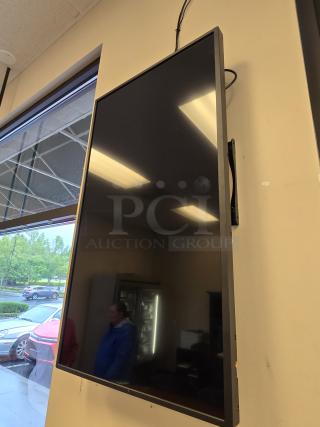 Sharp PN-B401K 40" Commercial Display LCD Monitor with Wall Mount. S/N: 8F043451. Monitor Can Be Installed In Either Portrait, Landscape Mode, Face-Up Or Even Face-Down Applications. See photos for examples. Features: Digital Signage Display - 39.5 Lcd Cortex A17 - 2 Gb - 1920 X 1080 - Edge Led - 300 Nit - 1080p - Hdmi - Usb - Serialethernet - Black