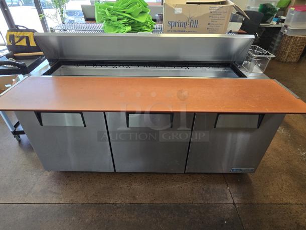 LIKE NEW!! True True TSSU-72-18-HC 72 3/8" 3 Door Refrigerated Sandwich Prep Table, 115 Volts	7.2 Amps	1 Phase. IN PERFECT WORKING ORDER!! S/N: 9675740. - Image 1 of 2