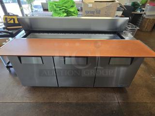 LIKE NEW!! True True TSSU-72-18-HC 72 3/8" 3 Door Refrigerated Sandwich Prep Table, 115 Volts	7.2 Amps	1 Phase. IN PERFECT WORKING ORDER!! S/N: 9675740.