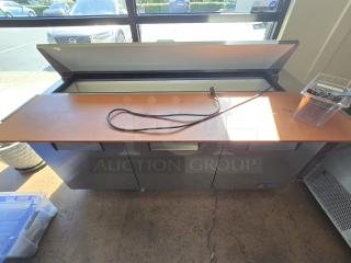 LIKE NEW!! True TSSU-72-18 72 3/8" 3 Door Refrigerated Sandwich Prep Table, 115 Volts	7.2 Amps	1 Phase. IN PERFECT WORKING ORDER! S/N: 3657100