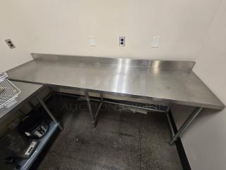 Allstrong 96"x30" stainless steel table with 5" backsplash, open base, excellent condition. Ideal for heavy-duty use.