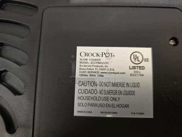 Crock-Pot SCCPMD2-CH slow cooker label showing model, UL listing, power specs, and usage warnings.