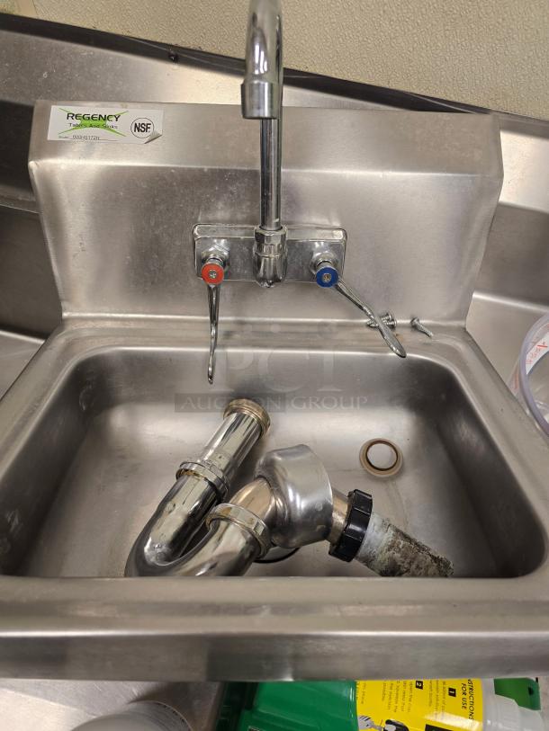 Regency 600HS17WBK 17"x15" wall-mounted hand sink, gooseneck faucet, wrist blades. NSF certified, used condition.