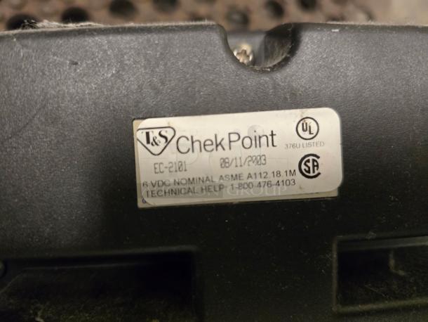 A label on the Advance Tabco 7-PS-61 hand sink shows certification marks, serial number EC-2101, and technical help details.