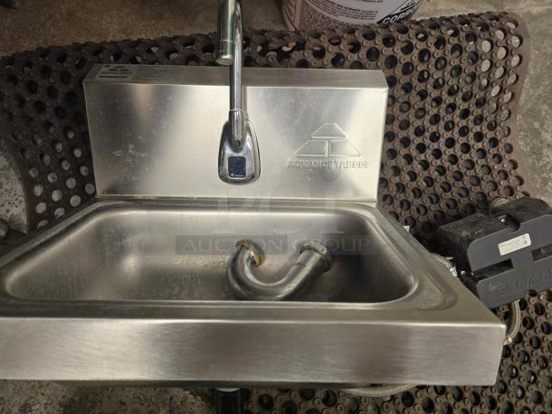Advance Tabco 7-PS-61 hand sink with hands-free automatic faucet. Stainless steel, tagged. Includes all parts, excellent condition.