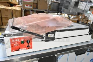 BRAND NEW SCRATCH AND DENT! Pavoni LIRA/E110V Lira Semi-Automatic Dessert Slicer. 110 Volts, 1 Phase.