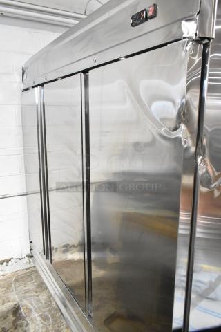 BRAND NEW SCRATCH AND DENT! 2025 Avantco 178SS3FHC Stainless Steel 3 Door Reach In Freezer w/ Poly Coated Racks. 115 Volts, 1 Phase.